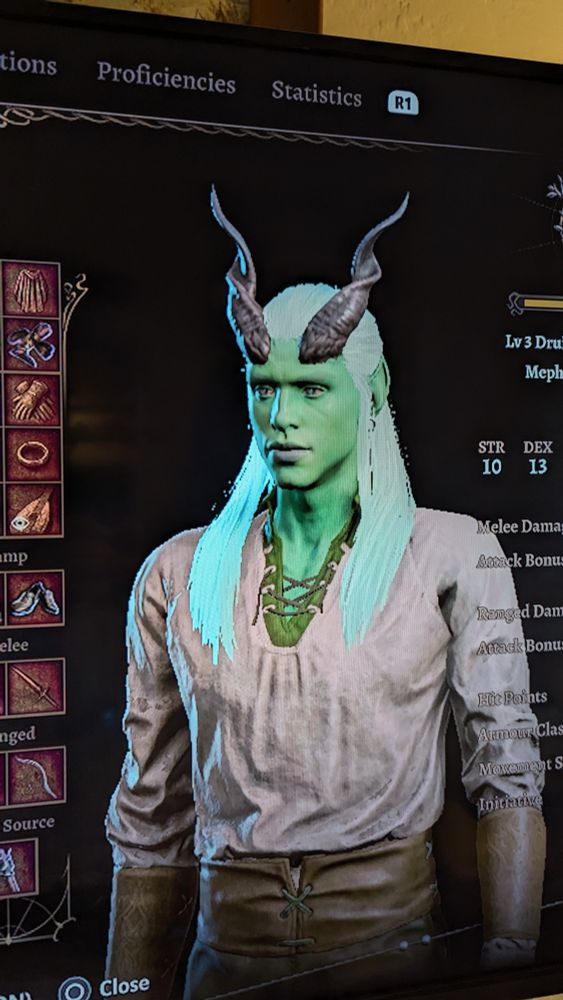 A waist-up image of the same tiefling, this time in just a plain white shirt