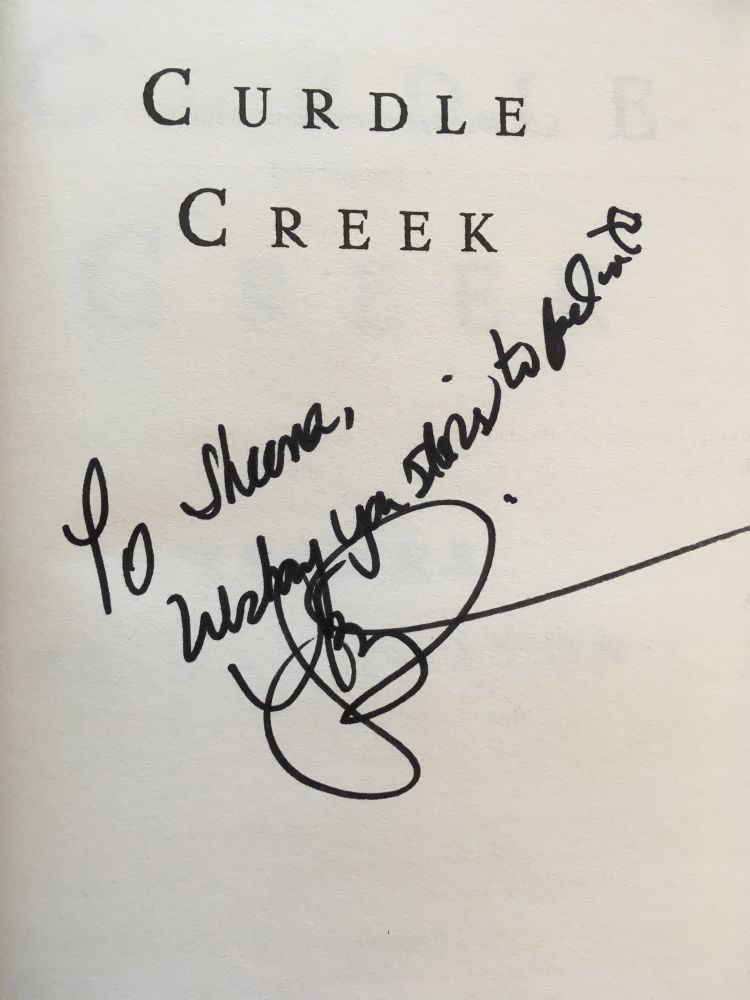 Signed + inscribed by the author. 