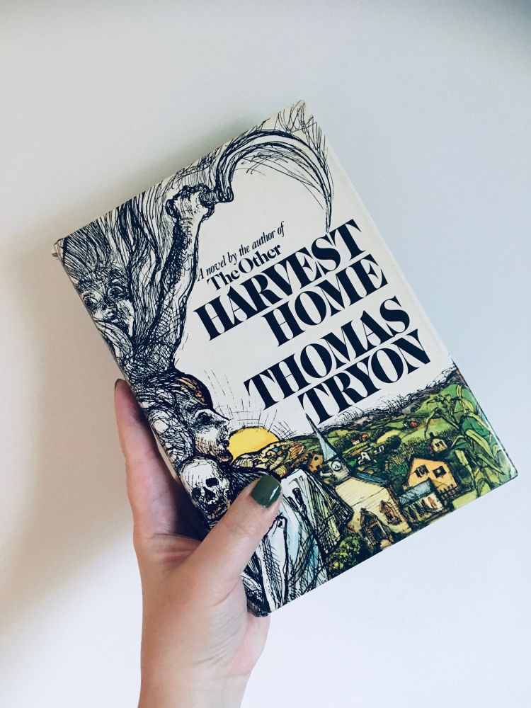 Holding a HC of Harvest Home by Thomas Tryon