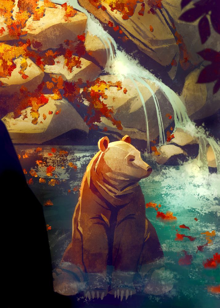 Grizzly bear sitting in water at the base of a small waterfall coming over rocks with fall leaves floating around.