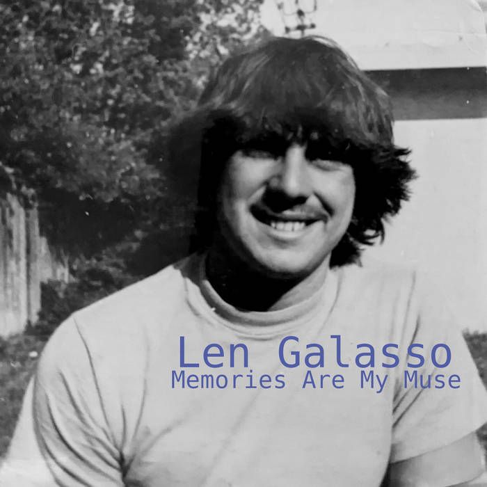 a monochromatic photograph of a young man of 15 or 16, with "hat hair" posing with a grin in a backyard