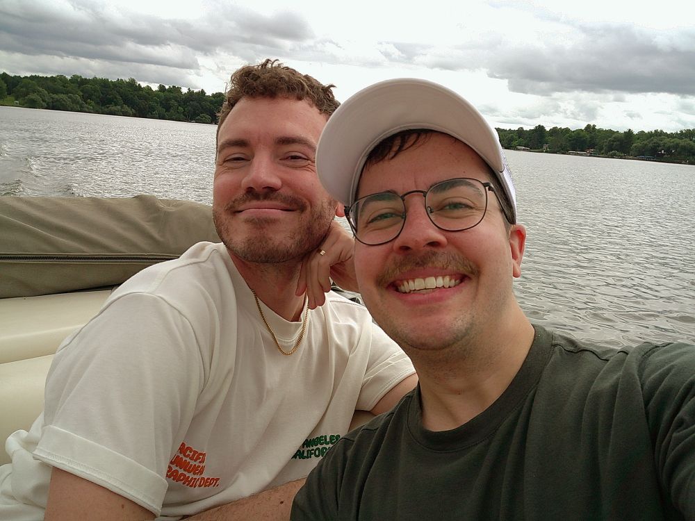me and michael on a boat in the middle of a lake