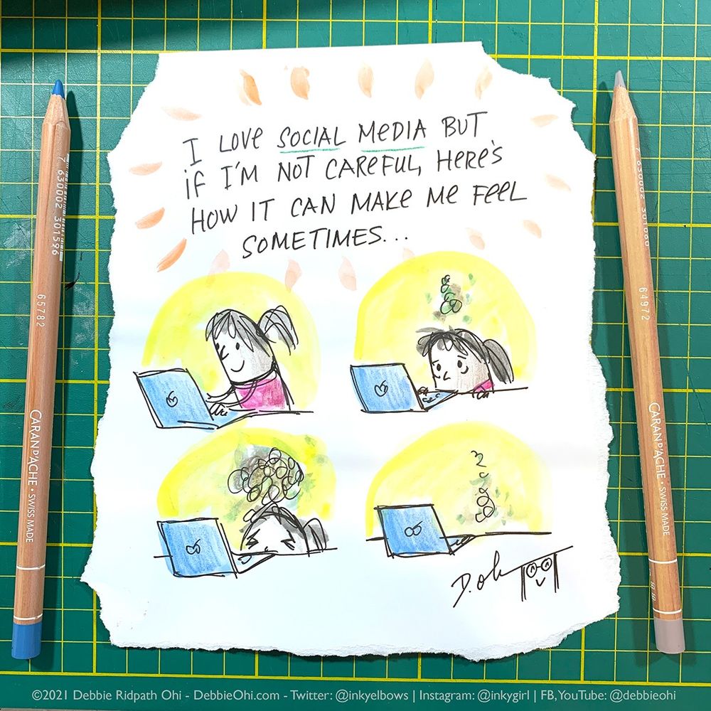 Photo of a hand-drawn, 4 panel comic, writer in front of computer gradually sinking down beneath desk. Handwritten title: "I love social media but if I'm not careful, here's how it can make me feel sometimes..." The drawing is on a piece of paper with torn edges, and we can see a colored pencil on each side of the piece of paper.