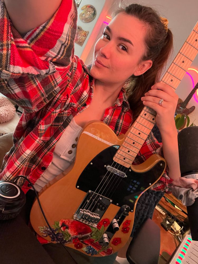 Selfie of me holding my guitar