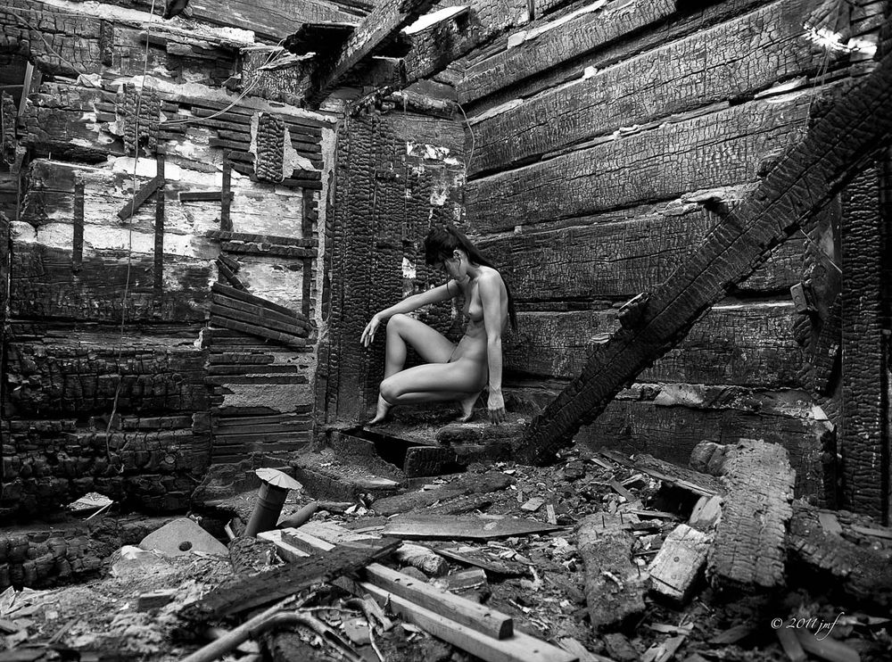The fine art nude image "Desolation" in black and white.