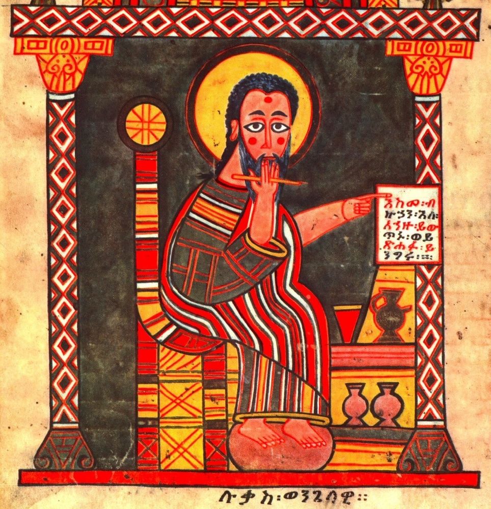 Ethiopian depiction of Saint Luke the Evangelist. He is shown as a scribe with a sheet of parchment containing the beginning of his Gospel in Classical Ethiopic in front of him. His hand is placed in front of his mouth as if in surprise.