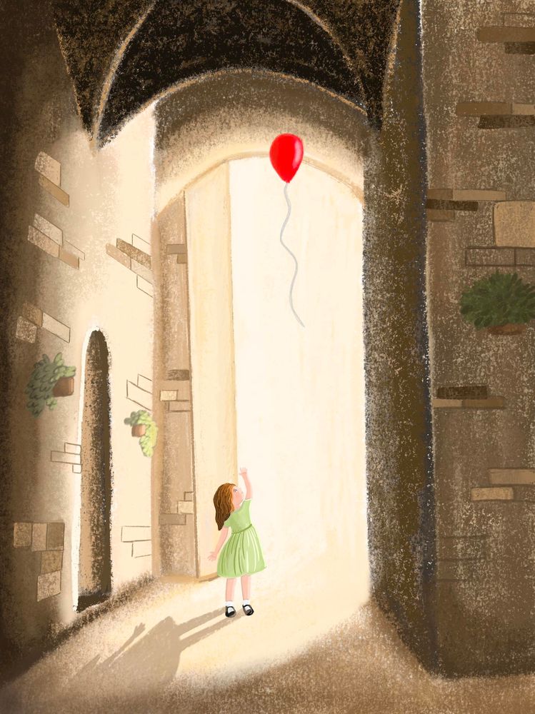 Girl looking at her balloon