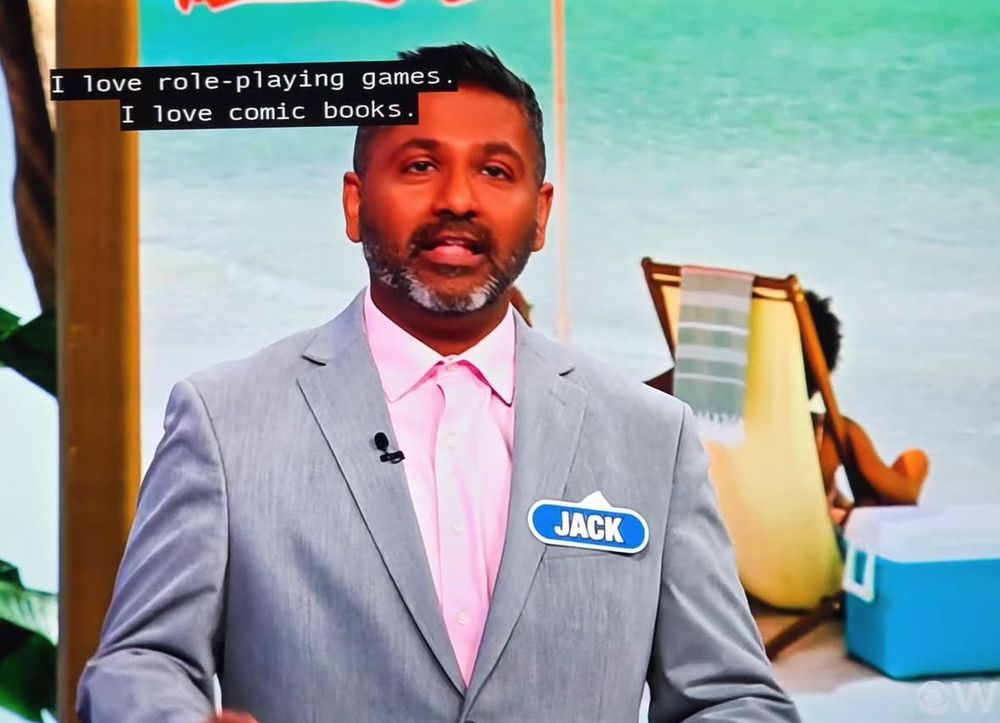 Jack Edathil, a handsome guest on Wheel of Fortune, saying that he loves Role Playing Games and Comic Books.
