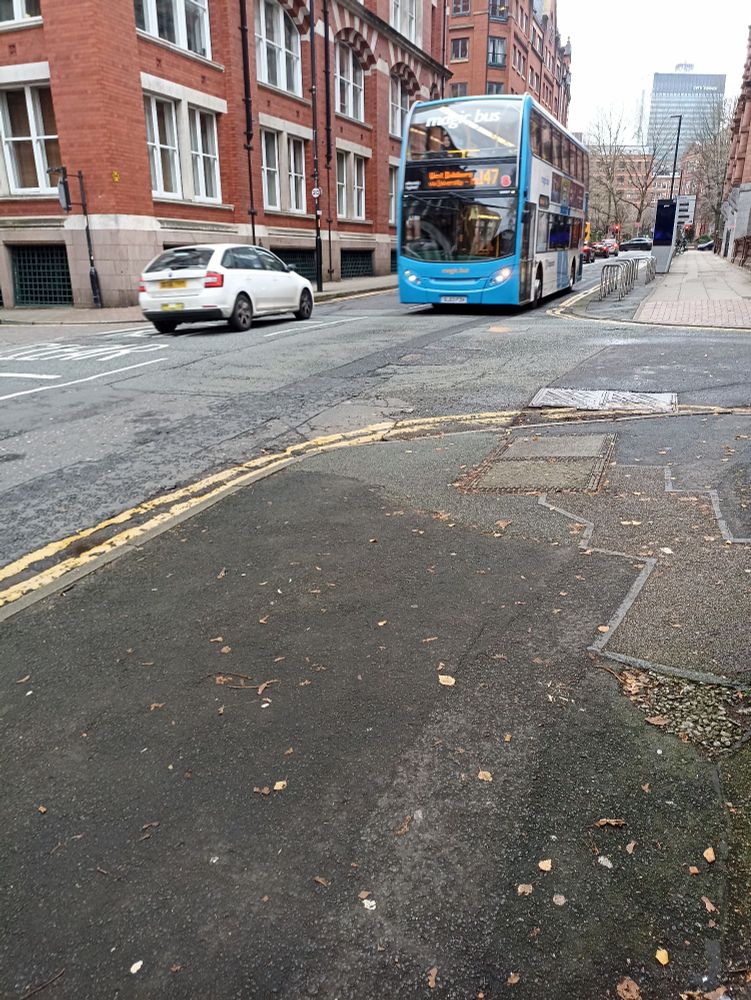 Purple bus on Manchester road going to the University of Manchester. This year the Bee Network will lead to the replacement of these buses.