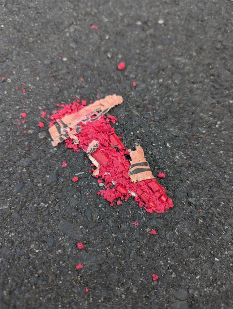 It's a crushed crayon on the side of the road