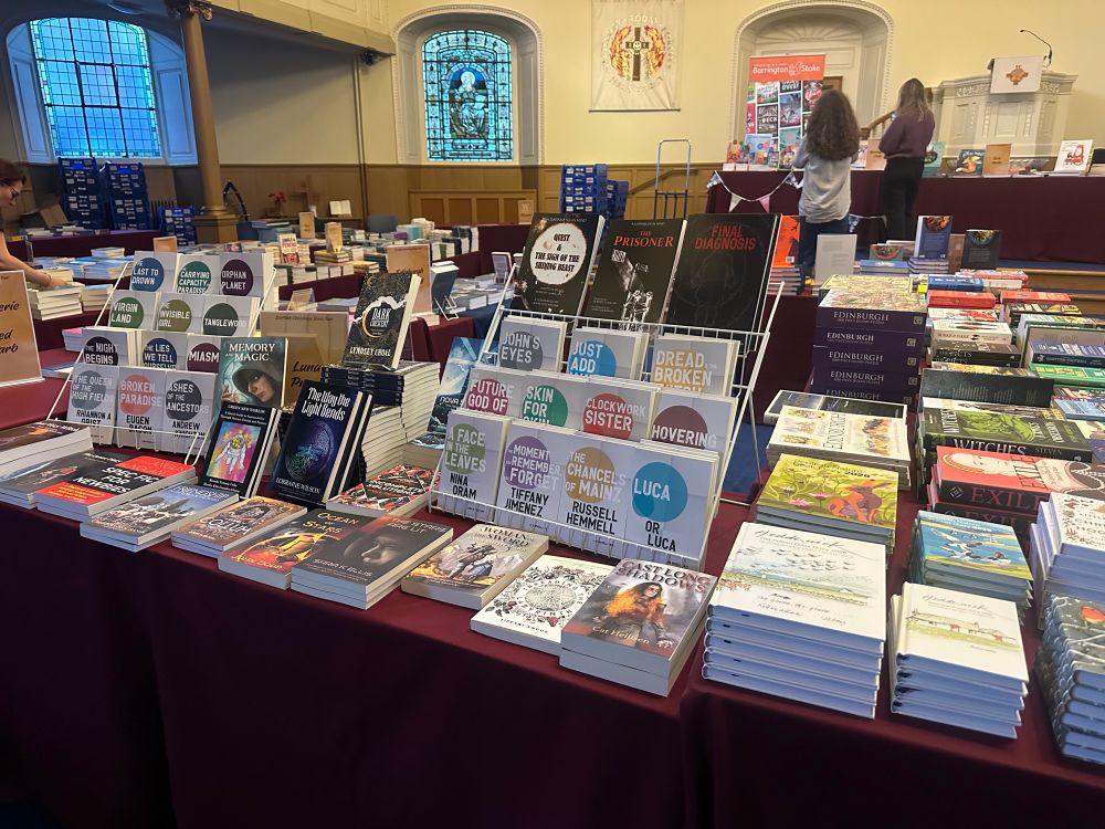 New town church. Tables loaded with books