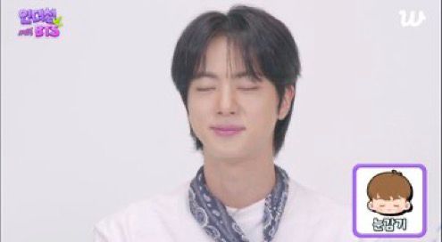 Jin has his eyes closed with a gentle smile, and the text overlay in Korean reads “눈감기” (closing eyes).