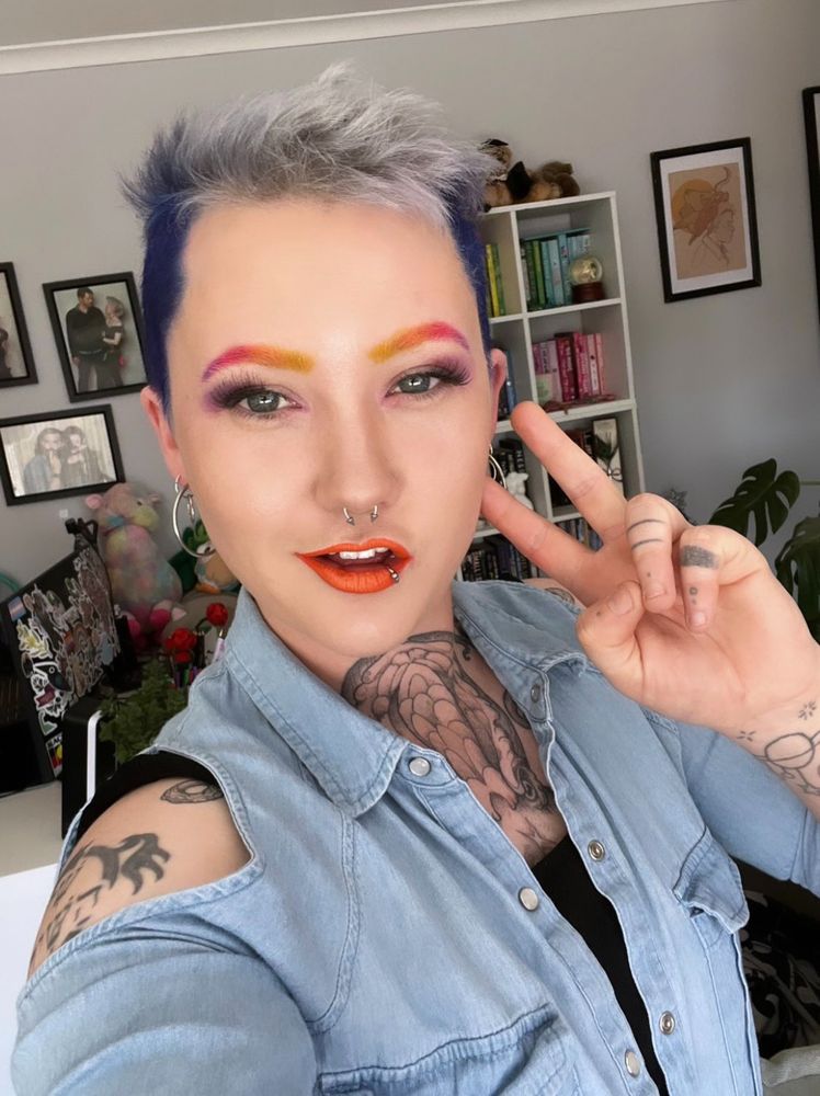 A picture of me making a peace sign. 