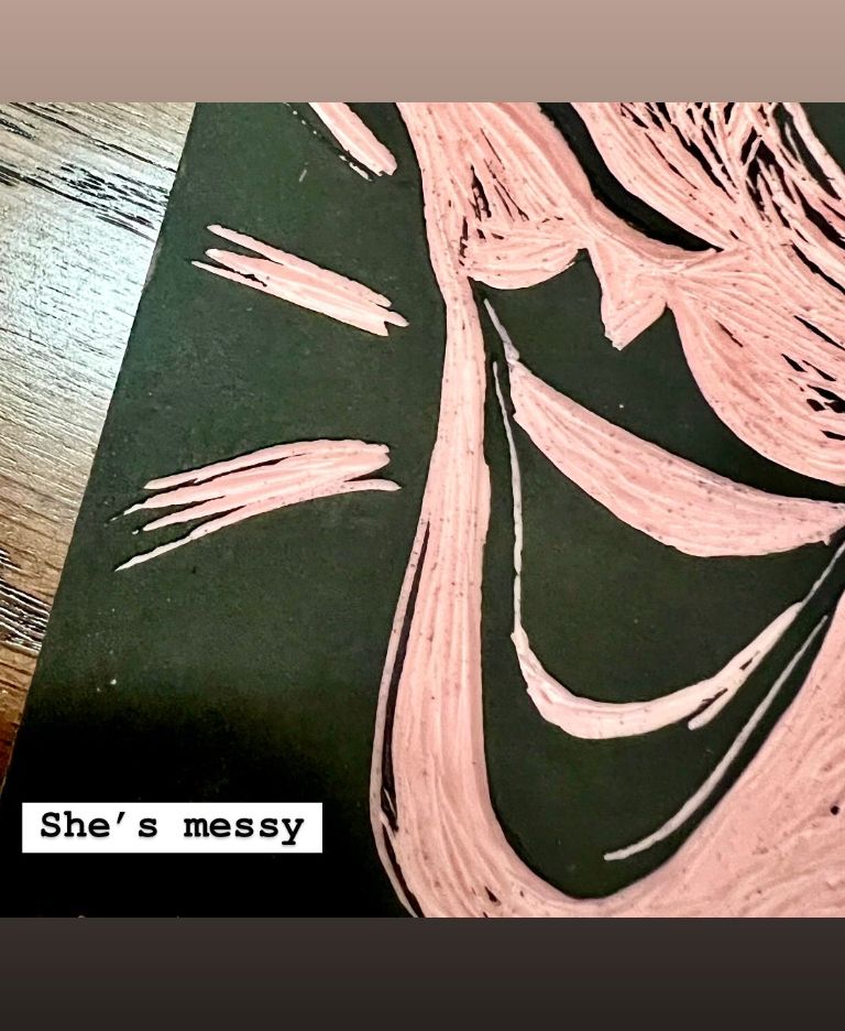 Another detail. Her mouth is wide open and smiling, Her lips are pointed and dark like she's wearing red lipstick. I might print them in red. There are lines coming from her mouth indicating that she is speaking enthusiastically. The panel with text will come later. 