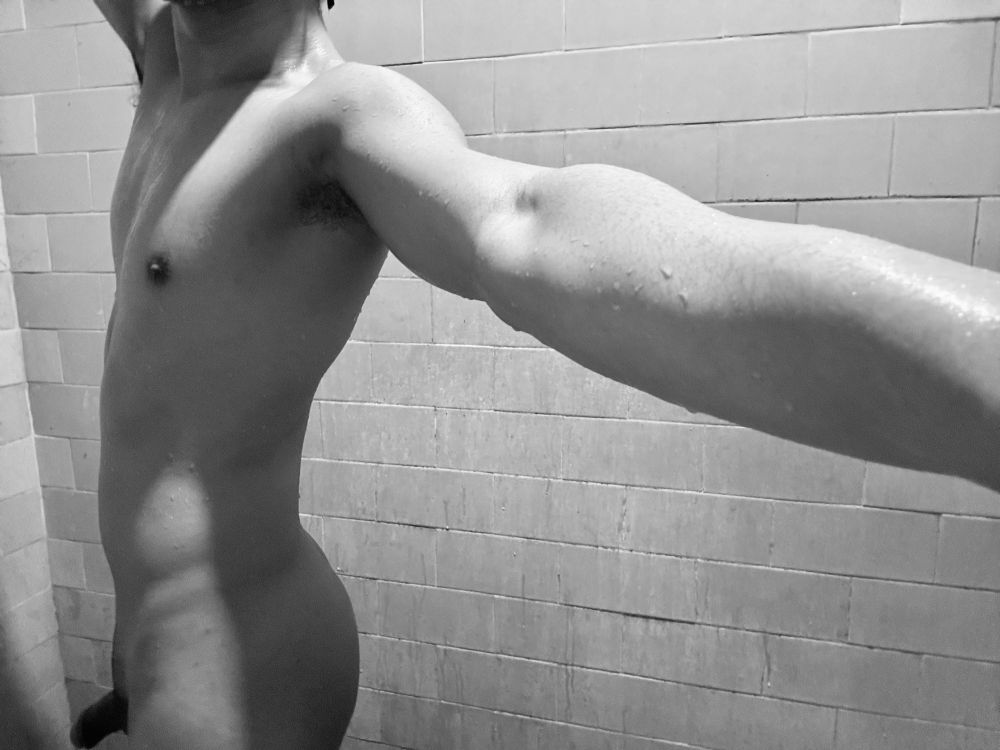 B&W nude selfie taken with an extended arm