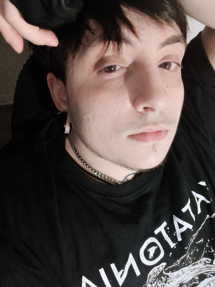 Photo of me (black clothes, black drawing glove, black hair, pale and tired)