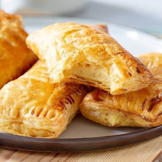kaasbroodjes (puff pastries with a large pocket of gouda in the center)