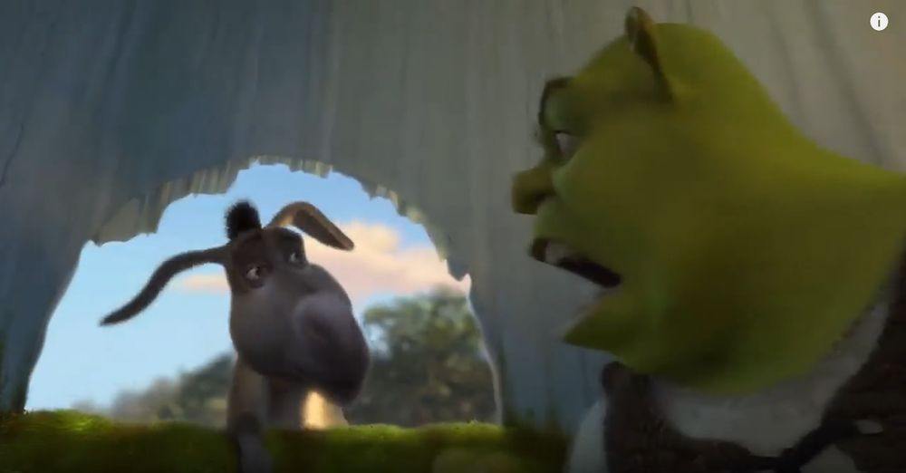screencap from Shrek 2 where Shrek is turned around in the onion carriage yelling at Donkey