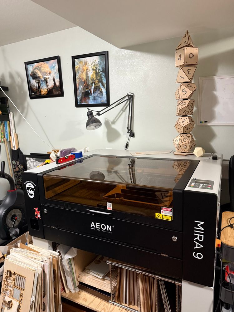 A large laser with a dice lamp on top. 