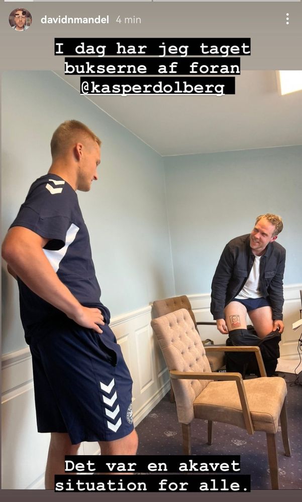 A Danish journalist drops his trousers to show presumably baffled footballer Kasper Dolberg a barely recognisable tattoo of him drawn on his thigh