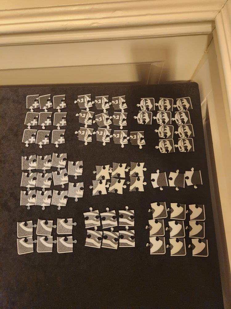 Extra puzzle pieces laid out neatly in the Tabeltop room.