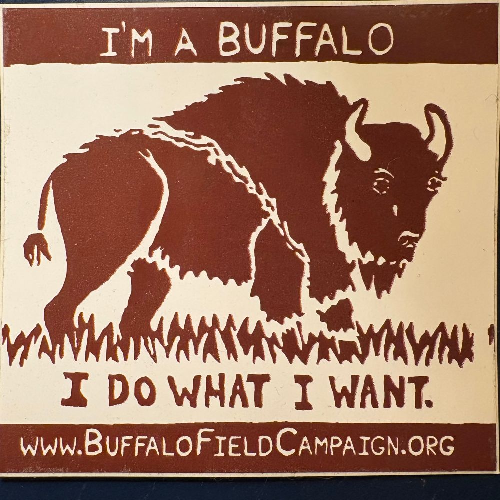 Sticker with brown ink on a white background showing a drawing of a buffalo, and the words I’M A BUFFALO I DO WHAT I WANT. www.BuffaloFieldOffice.org