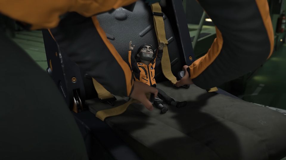 a pair of hands buckling dollman from DEATH STRANDING 2 into a seat