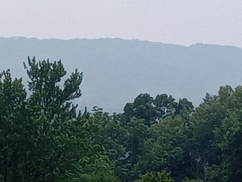 Barely visible mountain range in a smoky haze in central Pennsylvania.