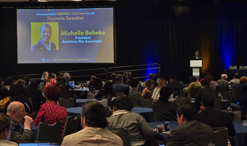 Photo of Michelle Behnke speaking at the conference