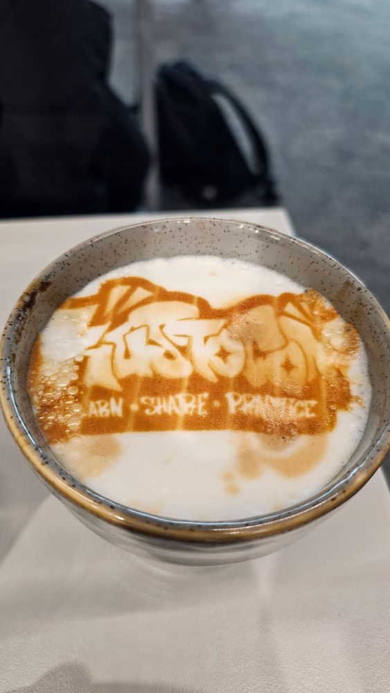 Cappuccino with #KustoCon printed in it, fancy. 