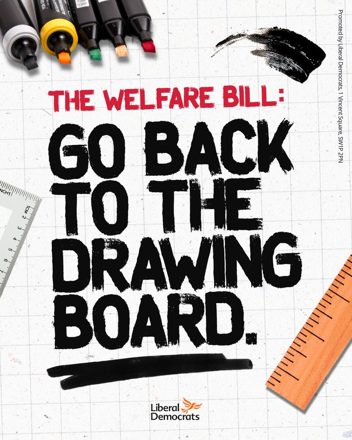 Various items of stationary on gridded paper - with a paint marker having written 'The Welfare Bill: Go Back to the drawing board"