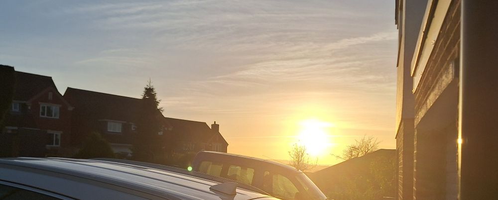 A picture of the sun low in the sky