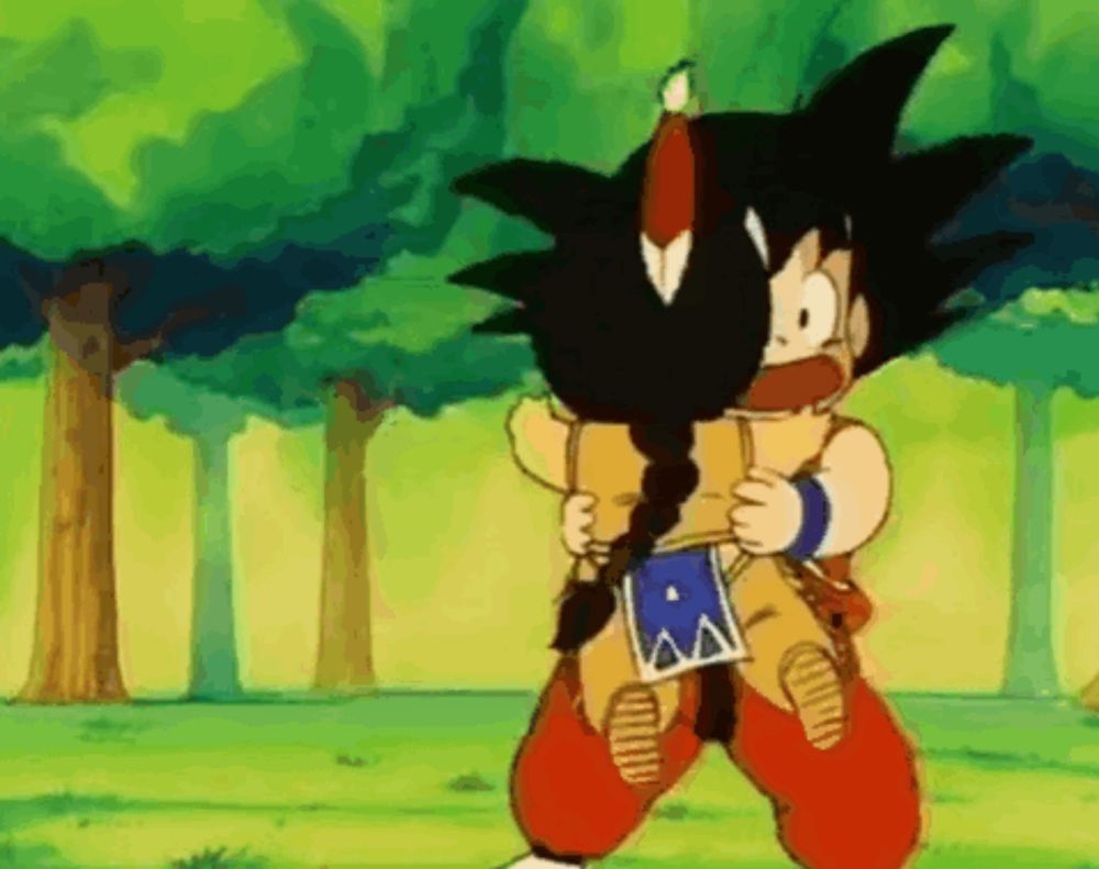 a cartoon character from dragon ball z is holding another cartoon character in his arms .