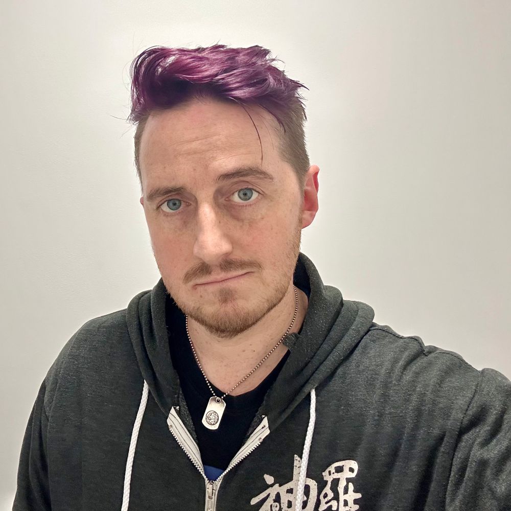 Me with a fresh cut and cost of paint (new hair cut and purple dyed hair)