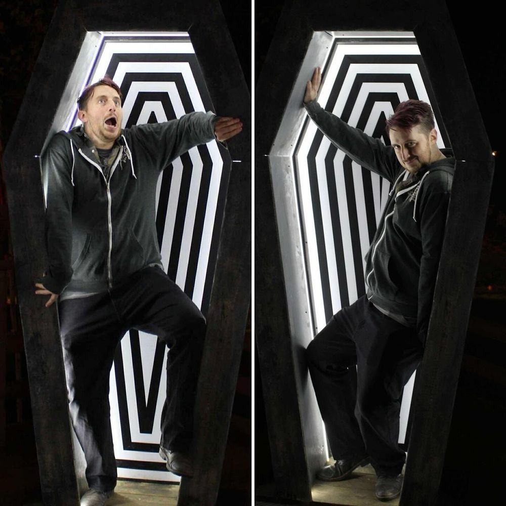 Me doing silly poses in a coffin 