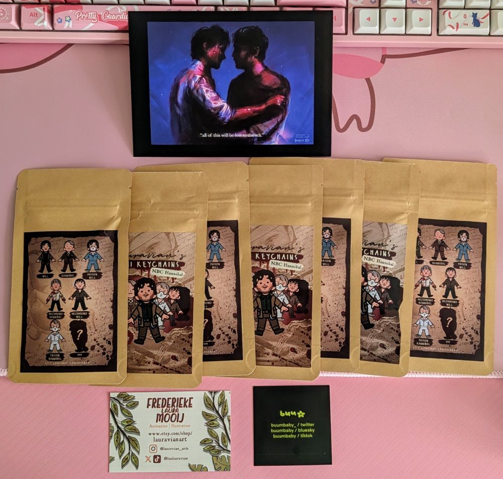 TWOTL art print by buu, set of 7 blind bags of adorable Hannibal Lecter and Will Graham keychains, and business cards for buu and Frederieke Laura Mooij