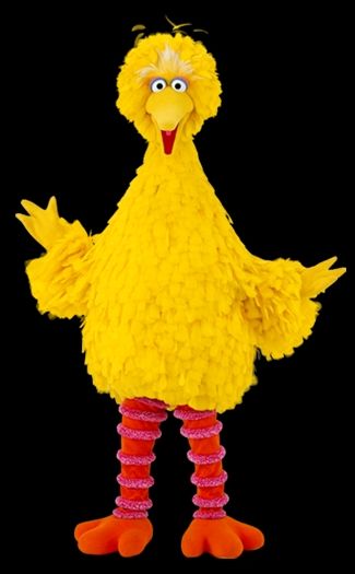 Sesame Street's Big Bird. He is tall, covered in yellow feathers, with a pointy face and googly eyes.