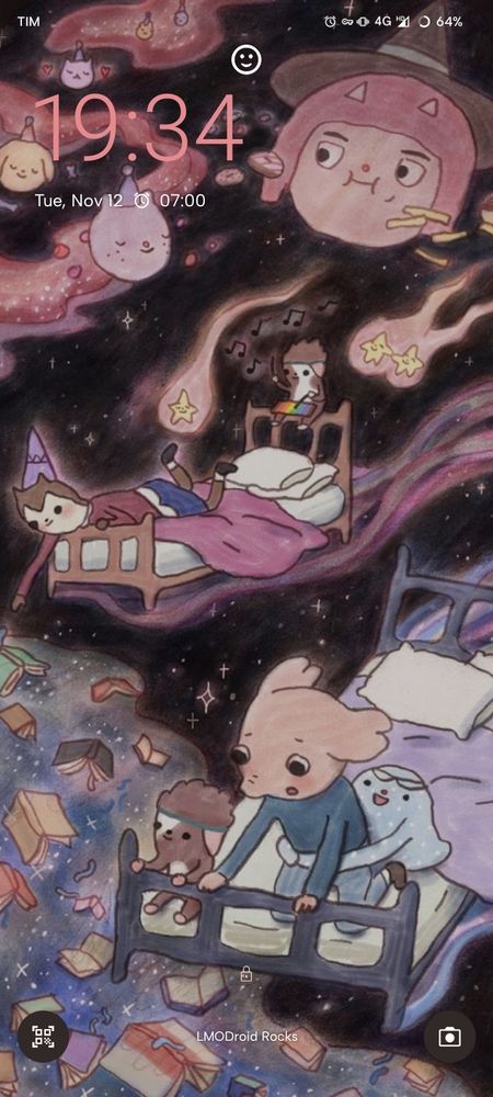 TIM

[Clock], [VPN], [Vibration], 4G with an [icon representing connection] and [A circle representing battery] which is 64%

A white icon of a smiling face

19:34

Tue, Nov 12 [Clock] 07:00

Wallpaper shows Oscar (the Elephant) and Hedgehog (the Hedgehog) on their beds in space while pajamas hugs Oscar in the back and a alien sitting on Oscar's bed and a alien playing xylophone on Hedgehog's bed, also there's Susie (the Cat) head alongside other animals heads as planets.

Icons of QR Scanner & Camera with "LMODroid Rocks" in the middle
