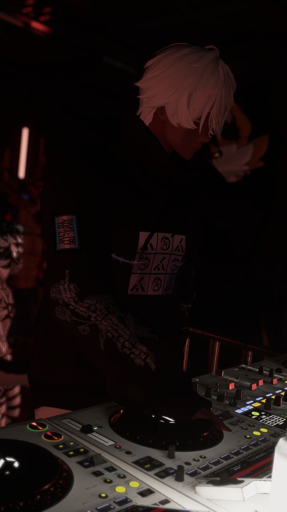 a photo of me at shelter taken by bboy
my eyes are closed, i look towards the side as my hands are on the decks
im wearing a shelter themed hoodie that i textured
on the sleeve, there is a trans flag patch with the words 'HAVE THE AUDACITY TO LIVE' on top of it
further down the sleeve reads,
"death before detransition
better to reign in hell than to serve in heaven
kataastaasang kagalanggalang na katipunan ng mga anak ng bayan
in passion - we stand, we fight, we live, and we love."