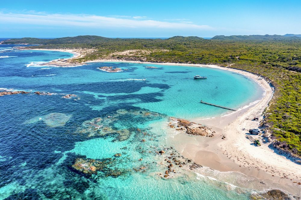 Aerial photograph of Peaceful Bay on the South Coast  of Western Australia. Azure waters in a bay.