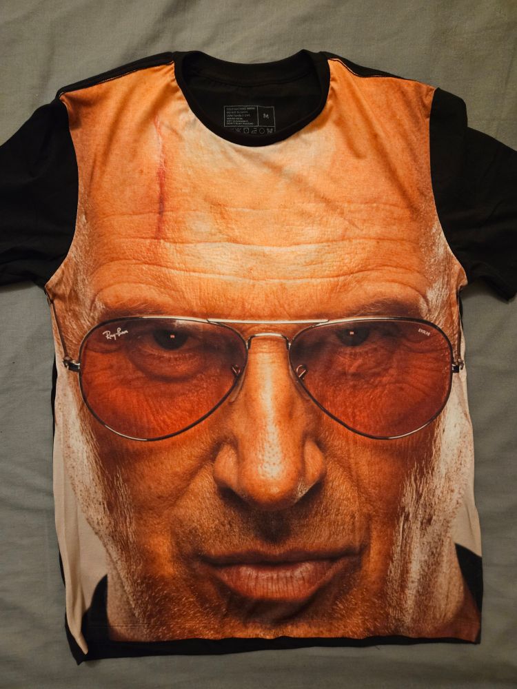 A t-shirt that is entirely the face of Don Callis 