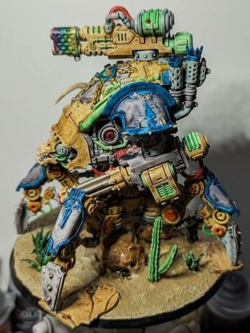 Model of a four-legged robot with skull for a head. It is a 'Brigand' Wardog from Warhammer 40k.