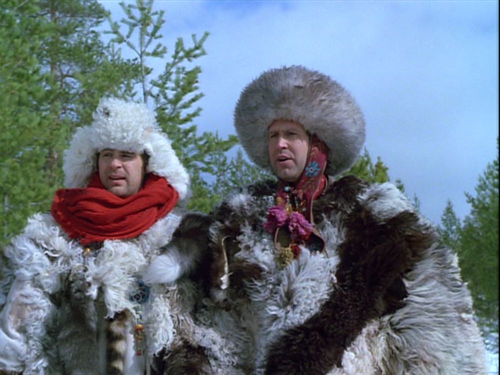 Dan Aykroyd and Chevy Chase dressed for arctic weather from a scene in spy comedy movie "Spies Like Us"