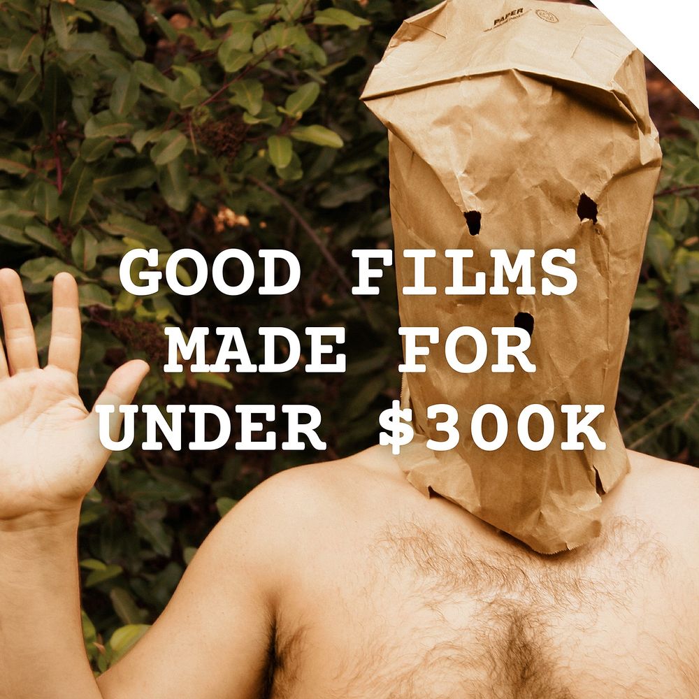 a still from the film *Baghead* featuring a bare-chested man waving at camera, while wearing a brown-paper bag over his head – text over the image reads: "Good films made for under $300K"