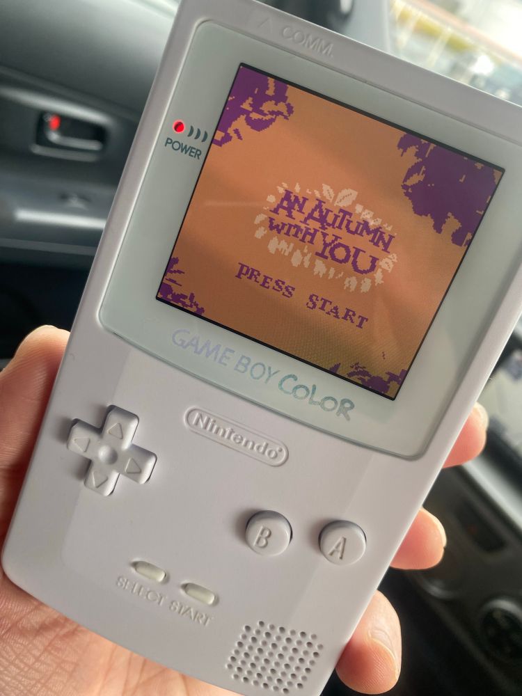 'An Autumn With You' game's title screen running on a white oled modded game boy color.