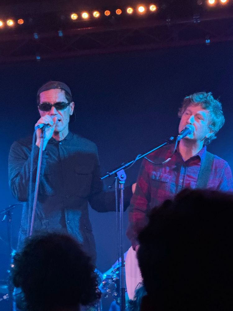 Michael Shannon in shades and Jason Narducy not in shades. 