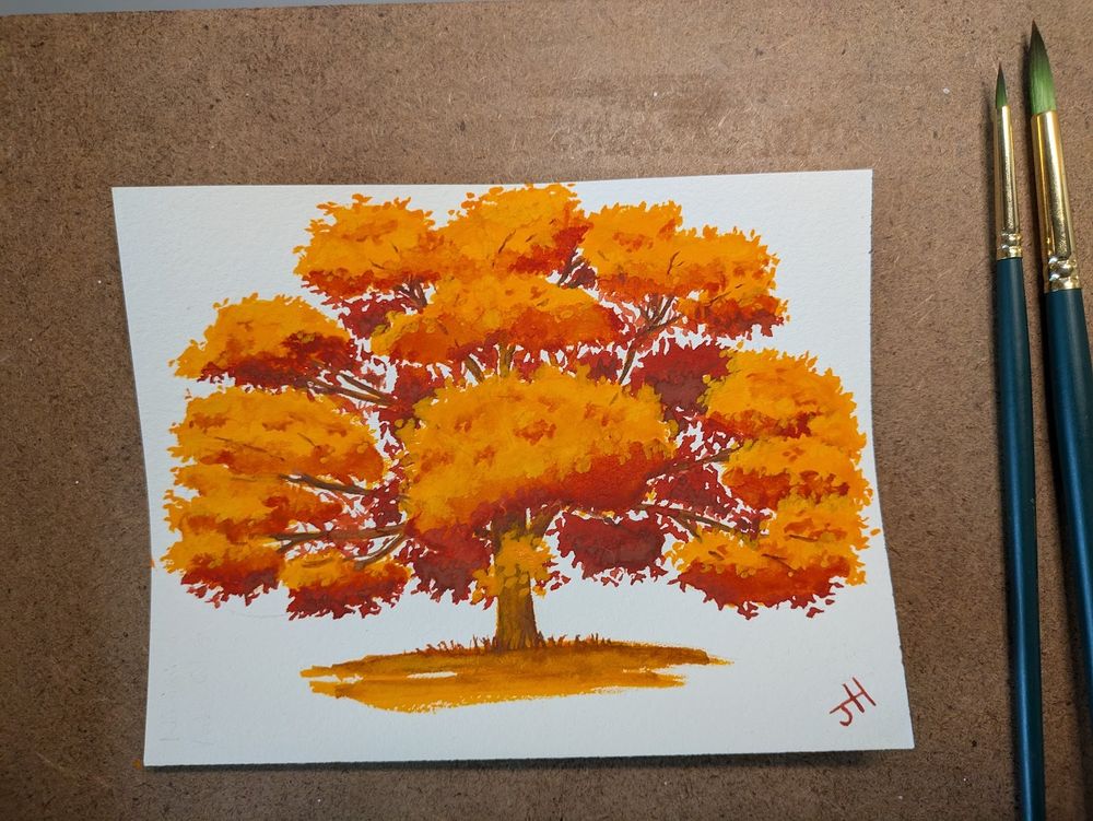 A small gouache painting of an autumnal tree in vibrant oranges and reds