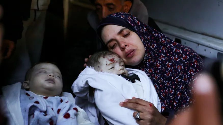 Rania Abu Anza cradles her twins, who were killed in an Israel strike on a house in Rafah, in the southern Gaza Strip, Sunday, March 3, 2024. Abu Anza and her husband, who was killed in the same strike, spent 10 years trying to get pregnant. (AP Photo/Hatem Ali) 
--------
After 10 years of trying, a Palestinian woman had twins. An Israeli strike killed them both
by: WAFAA SHURAFA and SAMY MAGDY, Associated Press

Posted: Mar 3, 2024 / 03:57 PM CST

Updated: Mar 3, 2024 / 04:00 PM CST
