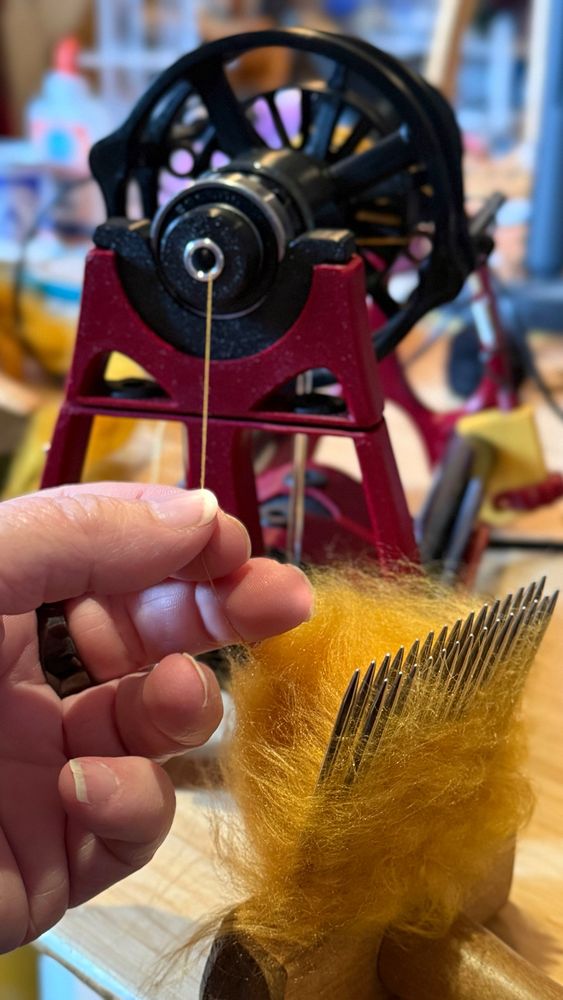 Handspinning thin gold thread for embroidery 