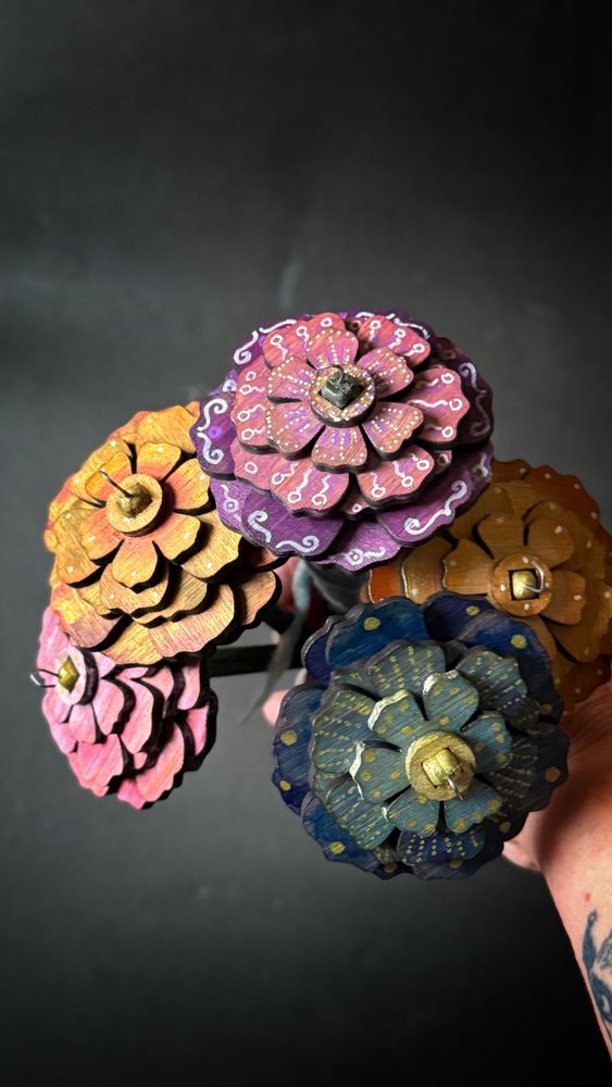 Drop spindles designed to look like flowers
